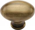 Photo of Oval 32mm Cabinet Knob AT C114 32-ANTIQUE BRASS=